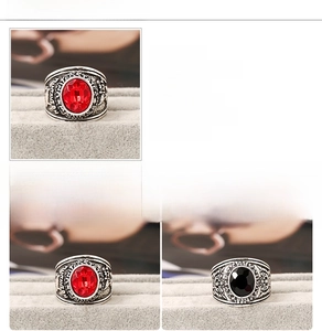 Detailed relief of eagle and United States Army text on vintage mens ruby ring