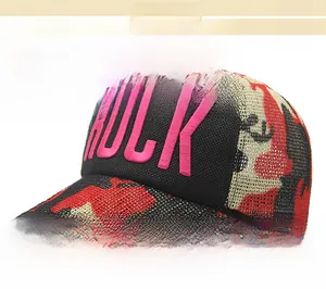 Detail of pink 3D embroidered ROCK text on camouflage mesh baseball cap crown