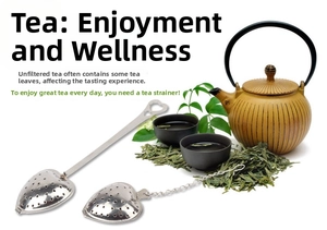 Detail of heart-shaped stainless steel tea infusers with handle and chain on tea table
