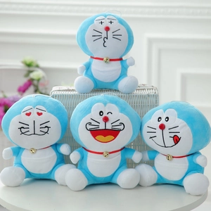 Detailed view of four soft blue plush dolls with different cute facial expressions