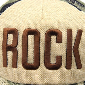 Beige trucker hat with ROCK embroidery and camo mesh back for outdoor sun protection