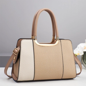 Elegant woven panel handbag for women with brown leather trim and dual carrying straps