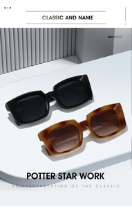 Close-up of black and tortoiseshell square sunglasses on a minimalist white pedestal