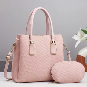 Elegant 2-piece pink tote bag set with matching pouch and gold metal hardware detailing
