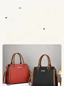 Detail of lychee pattern leather handbags in red and black with gold hardware accents