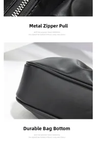 Close-up of silver metal zipper and reinforced base on black lychee grain leather handbag