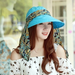 Blue sun hat with long vintage pattern shawl for neck protection during beach vacations