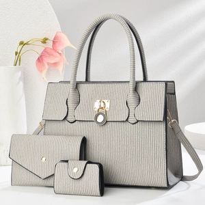 Three-piece set of light grey pleated handbags with golden hardware for women