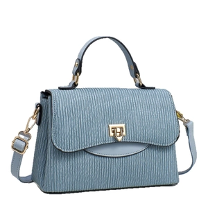 Light blue pleated shoulder bag with gold shield clasp and adjustable crossbody strap