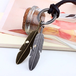 Vintage leather necklace with double feather pendants in bronze and silver finish
