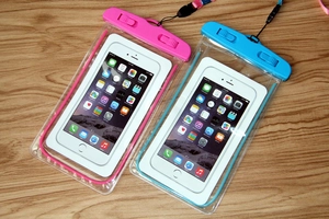 Dual-lock mechanism detail on transparent waterproof phone cases in pink and blue