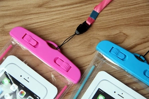 Close-up of waterproof phone pouches with dual rotary locks and durable neck lanyards
