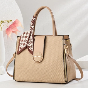 Retro beige woven handbag with brown leather trim and decorative silk scarf for women