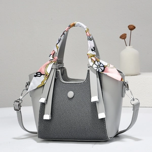 Elegant grey fan-shaped tote bag with silk scarf handle and detachable shoulder strap