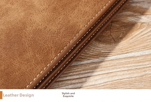 Vue macro d'un portefeuille en cuir marron avec coutures blanches et bords multicouches