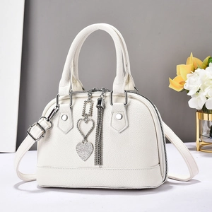 White macaron plaid pattern handbag with silver heart pendant and crossbody strap