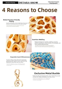 Macro detail of golden mushroom keychain with blue rhinestones and lobster clasp hook