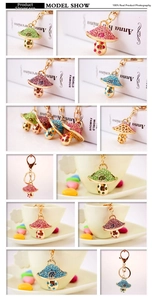 Detail of colorful mushroom keychains with rhinestones and lobster clasps for bags
