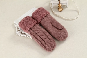 Women's pink cable knit mittens with plush faux fur cuffs for winter warmth