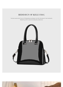 Close-up of black patent leather handbag with glossy mirror finish and gold hardware details