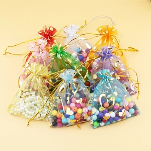 Multi-color organza gift bags 9x12cm with gold heart prints and drawstring closure