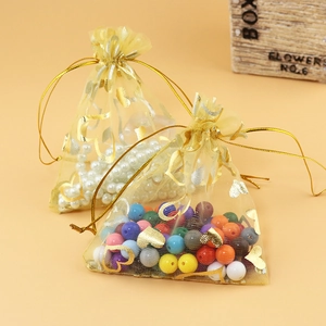 Golden heart print organza drawstring gift bag for jewelry packaging and favors