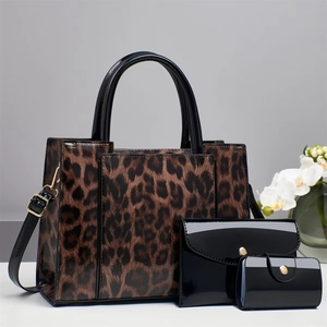 Three-piece women's handbag set featuring leopard print tote and black patent clutch