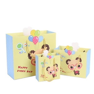 Cartoon Happy Every Day paper gift bags in three sizes with golden handles