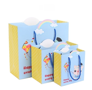 Three-size blue gift bags with cartoon pig and kite patterns for children birthday