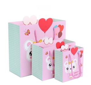 Detailed set of pink cartoon gift bags in three sizes with durable handles and heart patterns