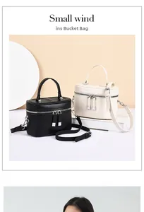 French style bucket bags in black and beige matte leather with detachable shoulder straps