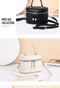 Dual-zipper quilted square box bags in black and cream with top handles and straps