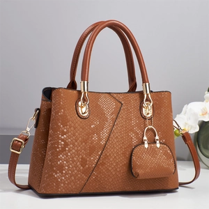 Elegant dark brown python embossed tote bag with gold hardware and matching coin purse