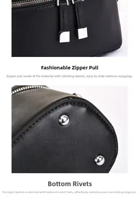 Close-up of black PU leather bag showing the zipper pull and bottom protective metal studs