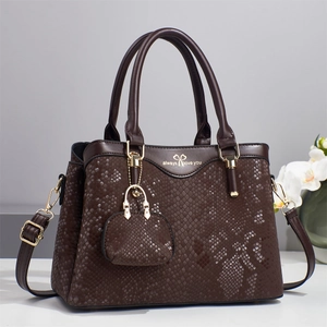 Elegant dark brown snake-print handbag with adjustable strap and small coin purse