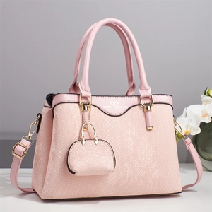 Pink snake-embossed composite handbag set with golden hardware and adjustable strap