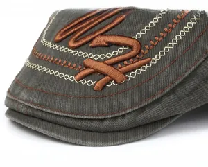 Detailed macro view of dark grey twill cotton brim with premium 3D letter embroidery
