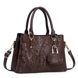 Elegant dark brown snake skin embossed tote bag with gold hardware and mini charm