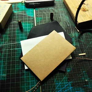 Mini vintage kraft paper envelopes and business card holders in black, white and brown