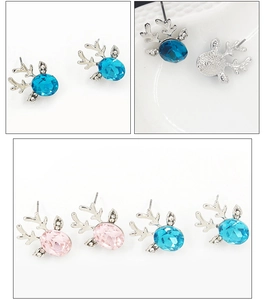 Close-up of crystal reindeer antler studs in blue and pink with metal backing