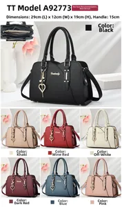 Detail view of the multi-compartment interior and seven color options for women's handbag