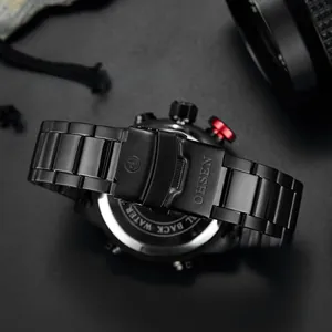 Detail of black brushed metal watch band with secure folding clasp and engraved back