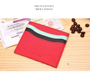 Slim rose red cross-grain leather card holder with mint green and black stripe details
