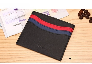 Minimalist slim black crossgrain leather card holder with red and blue ribbon detail