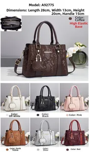 Detailed views of crossbody bags with snakeskin texture in seven available colors