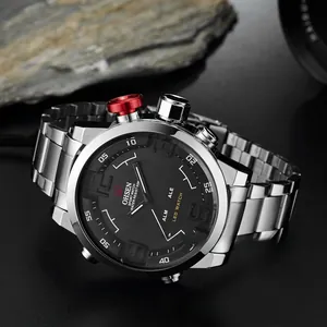 Detailed side view of sport watch with dual movement and red button accent