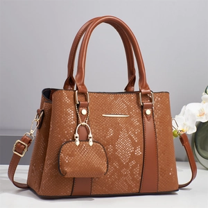 Brown snake pattern faux leather tote bag set with golden hardware and mini pouch