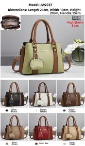 Detail view of large tote bag with multi-compartment interior and lychee grain leather