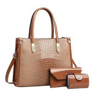 Three-piece brown crocodile pattern tote bag set with matching envelope clutch and card holder