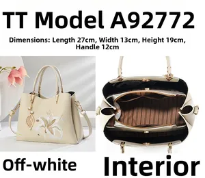 Detailansicht der cremefarbenen Handtasche A92772 Größe 27x13x19cm mit Blumenstickerei
